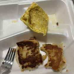 Hunter House Cafe - Top part & bottom part of biscuit w egg. fork for size.
