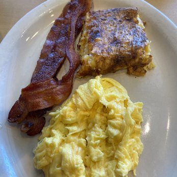 The Toasted Yolk Cafe - Two 2 Eggs and a Cake with bacon - Breakfast & Brunch Near Me - Spring, Texas The Toasted Yolk Cafe - Two 2 Eggs and a Cake with bacon - Breakfast & Brunch Near Me - Spring, Texas