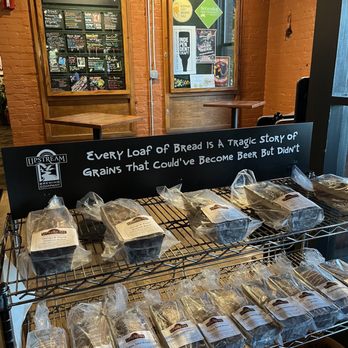 Upstream Brewing - a display of bread and pastries - Bars Near Me - Omaha, Nebraska