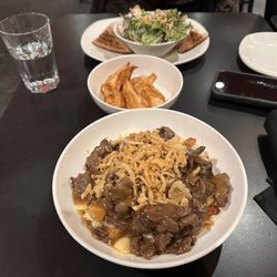 The Rail Coal Fire Bistro - "Philly" steak poutine, friend chicken dumplings, and club sandwich with salad