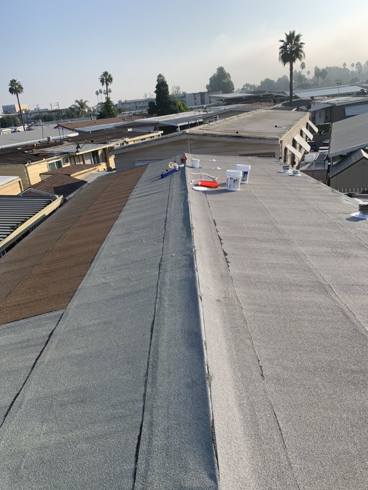 Slide of Adams Roofing