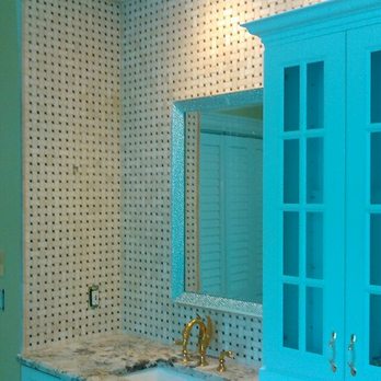 Ramsey Contracting - a bathroom with a blue cabinet and sink - General Contractors Near Me - Indian Trail, North Carolina Ramsey Contracting - a bathroom with a blue cabinet and sink - General Contractors Near Me - Indian Trail, North Carolina