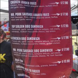 Mr Pork - Looking at the menu... steak, sausage and chicken happen, both in a sandwich, or served in a basket, over fries.