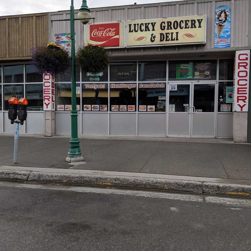 the front of lucky grocery and deli the front of lucky grocery and deli