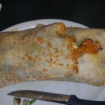 Manny's Snack Shack - Breakfast burrito, if I had to guess, it had 6 eggs in it with large amounts of vegetables... 3/4th went in a to go box. - Breakfast & Brunch Near Me - Twin Lakes, Wisconsin
