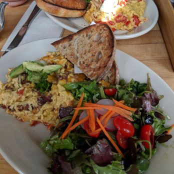 Eats - Front: B.A.T. scramble with salad & sourdough bread. Back: Lox scramble with salad & bagel. - American Near Me - San Francisco, California
