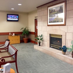 Methodist Health System - Part of their spacious front lobby with television, fireplace, and free coffee and bottled water.