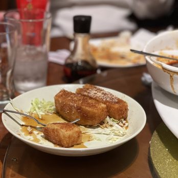 Frying Fish - Sweet rice cake - Szechuan Near Me - Bellevue, Washington Frying Fish - Sweet rice cake - Szechuan Near Me - Bellevue, Washington