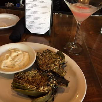 Angelo’s Taverna - Grilled artichokes and the Alice and Watermeland cocktail. - Italian Near Me - Denver, Colorado Angelo’s Taverna - Grilled artichokes and the Alice and Watermeland cocktail. - Italian Near Me - Denver, Colorado