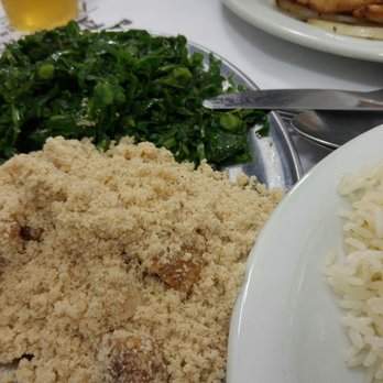 Bar do Mineiro - You add this to your rice it's kinda like a garlic powdered with small chunks of pork. - Brazilian Near Me - Rio de Janeiro, RJ