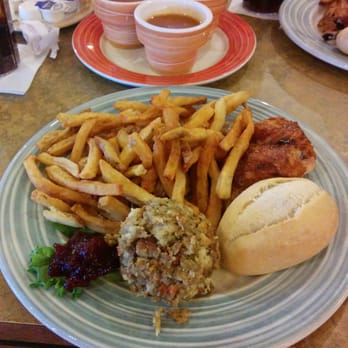 Swiss Chalet - a plate of french fries and a burger - Comfort Food Near Me - Sault Ste. Marie, Ontario Swiss Chalet - a plate of french fries and a burger - Comfort Food Near Me - Sault Ste. Marie, Ontario
