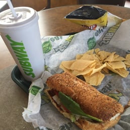 I love this sandwich chicken teriyaki lettuce tomatoes spinach .