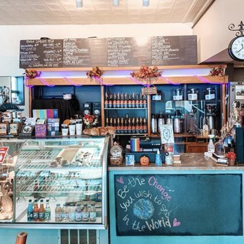 Common Ground Coffee House - a counter with a clock - Coffee & Tea Near Me - Grand Rapids, Michigan