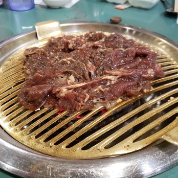 Hae Woon Dae BBQ koreanbarbecue.com - Regular bulgogi on charcoal grill. - Korean Near Me - Doraville, Georgia