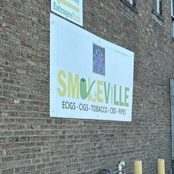 SmokeVille - Here's the side of the building but it's right on the corner of Clinton and mckinnie and Lafayette st.