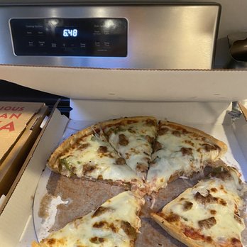 Potesta's Italian Kitchen - What's in this photo? A waste of money. - Pizza Near Me - Zion, Illinois