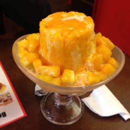 Mango Snowy Ice w/ mango chunks, sago, ai-yu, evaporated milk Mango Snowy Ice w/ mango chunks, sago, ai-yu, evaporated milk