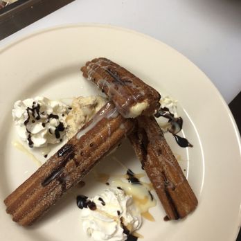 Trigo food - a plate of churros and whipped cream - Food Trucks Near Me - Gypsum, Colorado Trigo food - a plate of churros and whipped cream - Food Trucks Near Me - Gypsum, Colorado