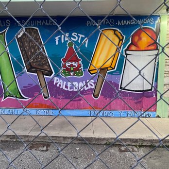 Fiesta Palebolis - a mural on the side of a building - Ice Cream & Frozen Yogurt Near Me - San Antonio, Texas
