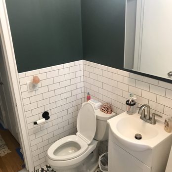 Steve Sposato Construction - a bathroom with a toilet and sink - General Contractors Near Me Steve Sposato Construction - a bathroom with a toilet and sink - General Contractors Near Me