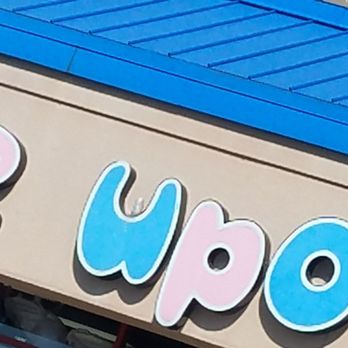 Once Upon A Child - Can't help but to notice this bottle on top on the U on the sign. - Children's Clothing Near Me - Indianapolis, Indiana Once Upon A Child - Can't help but to notice this bottle on top on the U on the sign. - Children's Clothing Near Me - Indianapolis, Indiana