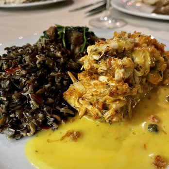 Signature Grill - Halibut topped with crabmeat. Minnesota wild rice and mixed mushrooms! - Seafood Near Me - Edmond, Oklahoma Signature Grill - Halibut topped with crabmeat. Minnesota wild rice and mixed mushrooms! - Seafood Near Me - Edmond, Oklahoma