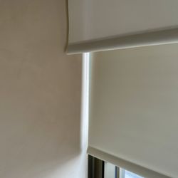 Solar shade and blackout shade on the same window.
