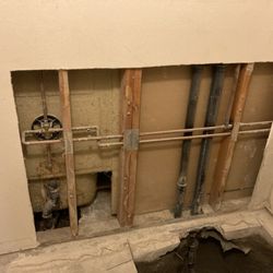 Ask Ryan Plumbing - Existing plumbing before half bath remodel rough plumbing installed.