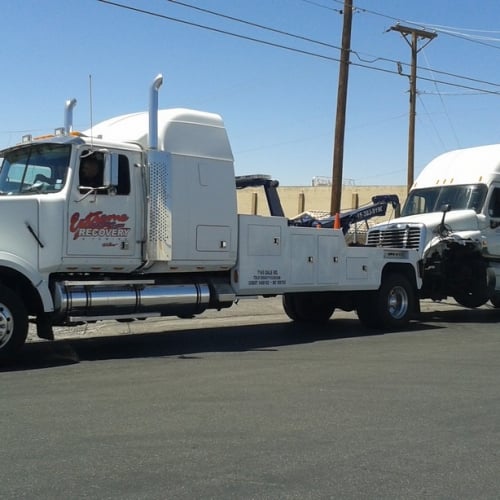 Slide of Extreme Recovery & Towing
