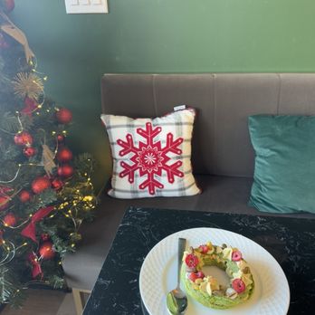 Krem Bakery & Cafe - pistachio eclair and my seat - Bakeries Near Me - Virginia Beach, Virginia Krem Bakery & Cafe - pistachio eclair and my seat - Bakeries Near Me - Virginia Beach, Virginia