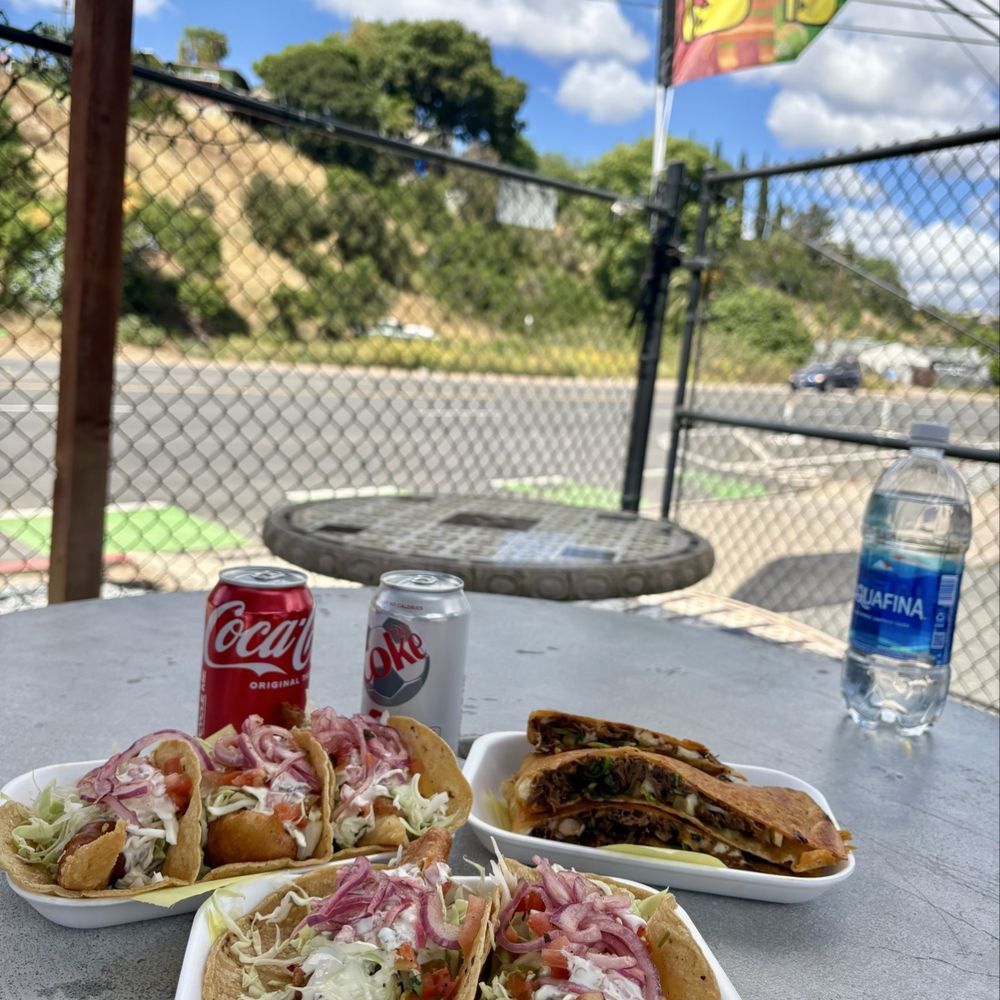 Canned sodas are $4 each  -  We got 5 fish tacos & Birria Quesadillas, total was $46.