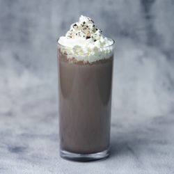Ogi Taste - Cookies & Cream Frappe
A well-blended mix of fine cookies & cream base, milk, and ice, topped with whip cream and chocolate drizzle