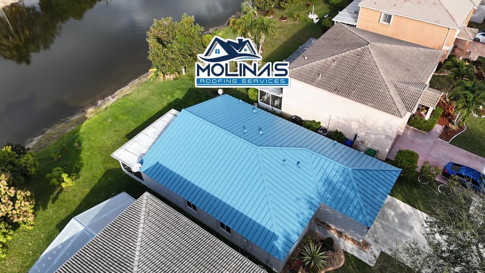 Slide of Molina's Roofing Services