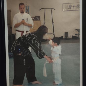 Kim’s Hapkido -  Arcadia - Son at age 4: fist yellow stripe. Given by Mrs. Clark (to be), Mr. Clark in background. San Dimas studio 2009 - Martial Arts Near Me - Arcadia, California