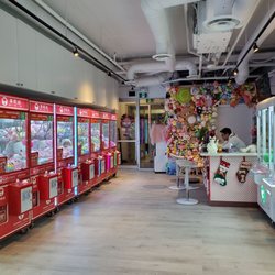 Catchers' Station - Interior with mini stuffed animal wall in far back.