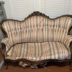 Milburn Upholstery - Very sturdy vintage couch that has dog scratches and needs new upholstery.