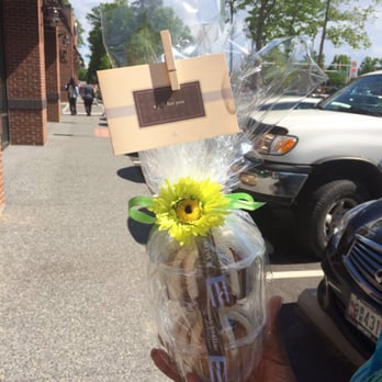 Nothing Bundt Cakes - The decorative wrapping for the two we got. You pick the ribbon and flower color. - Desserts Near Me - Gaithersburg, Maryland