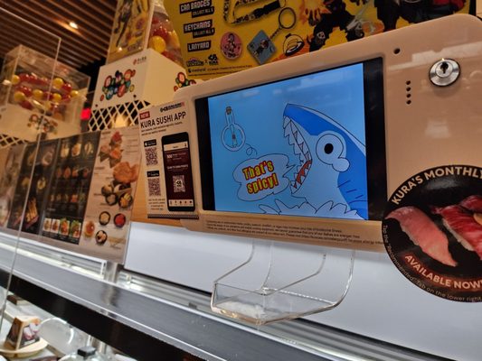 Kura Revolving Sushi Bar by null