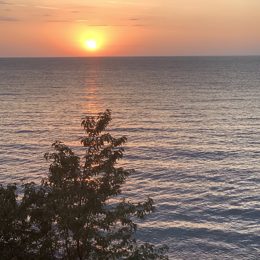 Keweenaw Castle Resort - Sunset view from our room in the Turret Suite. - Resorts Near Me - Allouez, Michigan