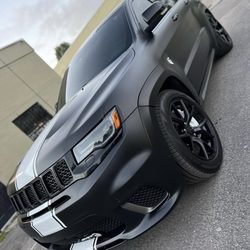 Pro Dips - 2018 Jeep Track wrapped in Satin Black with Reflective White Stripes, Brakes, Emblems, and Accents. High Gloss Black Rims too.