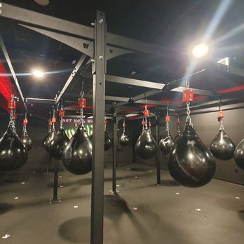 Rumble Boxing - The punching bags are close to each other, so hit in the direction of the arrows on the floor - Boxing Near Me - Burbank, California