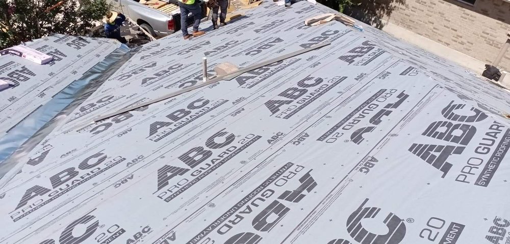 Slide of Regio's Roofing