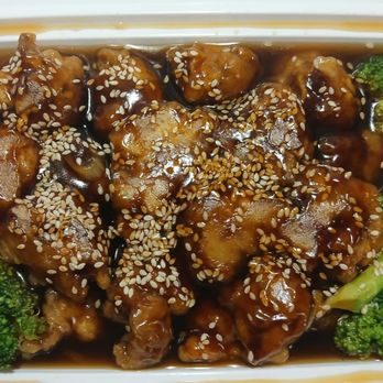 China Express - Sesame Beef: Fried battered beef in sweet sesame sauce, on a bed of broccoli, topped with sesame seeds - Chinese Near Me - Guttenberg, New Jersey