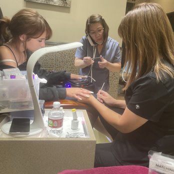 Elite Spa - Making the almond shape, lady talking on the phone while she does my daughter's nails - Nail Salons Near Me - Fort Worth, Texas