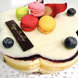 Paul Lafayet - blueberry cheesecake topped with white chocolate and macaron