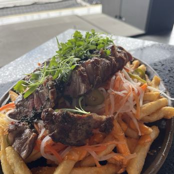 Atomic Golf - Bah mi fries, delicious!! Would absolutely get it again. Big enough to share. We didn't finish it - Sports Bars Near Me - Las Vegas, Nevada Atomic Golf - Bah mi fries, delicious!! Would absolutely get it again. Big enough to share. We didn't finish it - Sports Bars Near Me - Las Vegas, Nevada