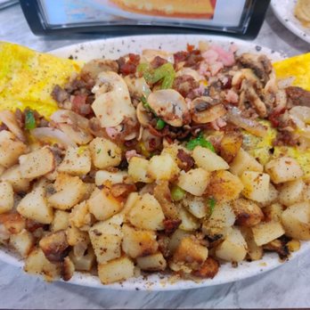 Golden Egg Pancake House - Carolina omelet with home fries. - Breakfast & Brunch Near Me - Surfside Beach, South Carolina Golden Egg Pancake House - Carolina omelet with home fries. - Breakfast & Brunch Near Me - Surfside Beach, South Carolina