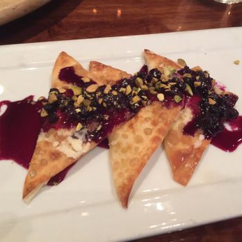 Bistro 7 - Brie Wontons with Fruit Compote. Amazing stuff. I ordered two orders. - New American Near Me - Reno, Nevada Bistro 7 - Brie Wontons with Fruit Compote. Amazing stuff. I ordered two orders. - New American Near Me - Reno, Nevada