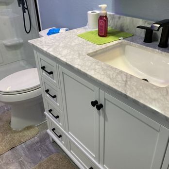 Mega Patch Xpress - a bathroom with a sink and toilet - General Contractors Near Me