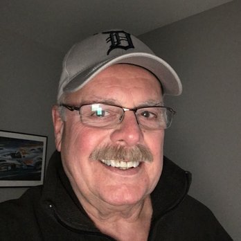 The Hearth - a man with glasses and a baseball cap - Pubs Near Me - Gladwin, Michigan The Hearth - a man with glasses and a baseball cap - Pubs Near Me - Gladwin, Michigan